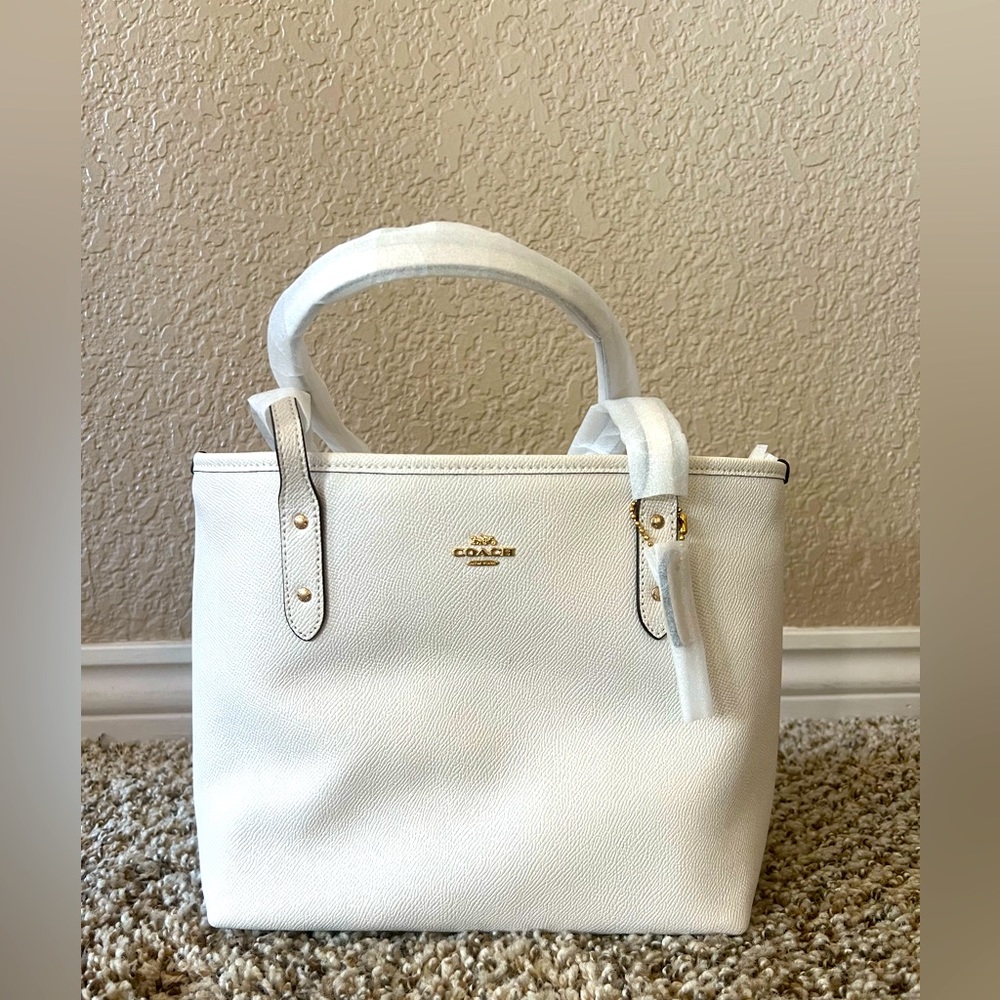 Brand new light pink Coach handbag